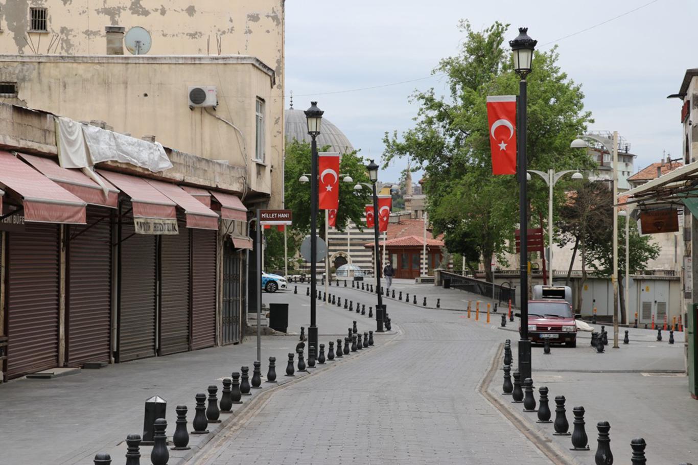 Turkey’s cities fall silent as a two-day curfew begins